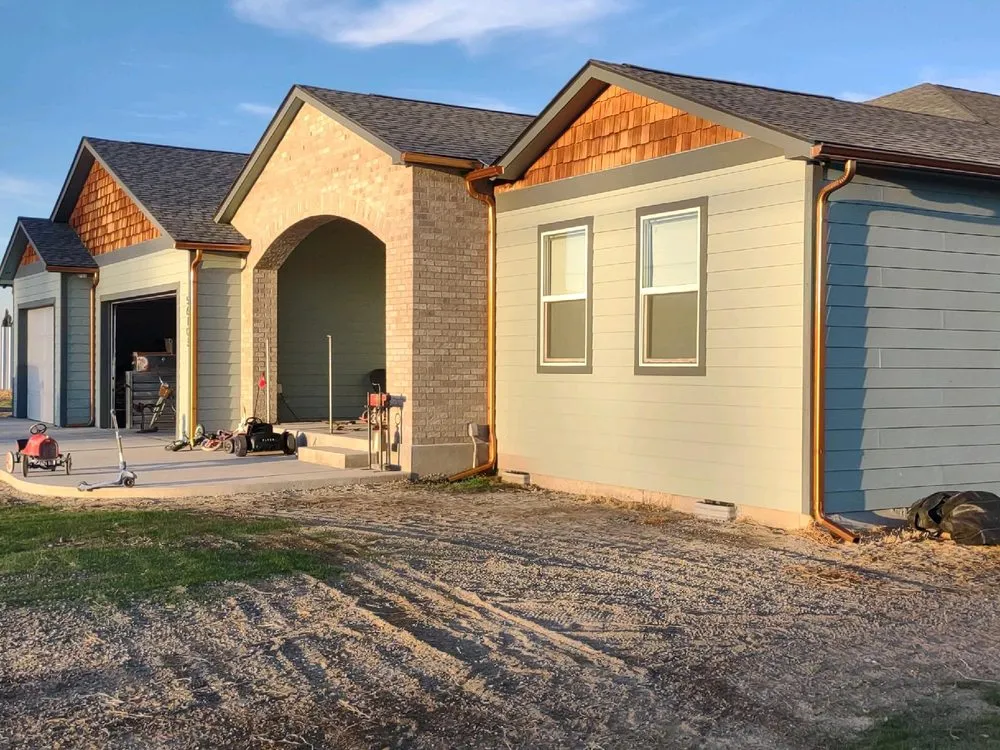 Slide of AHLGOOD Raingutters and Construction