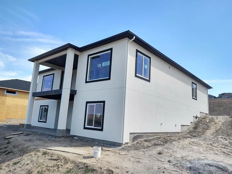 Slide of AHLGOOD Raingutters and Construction