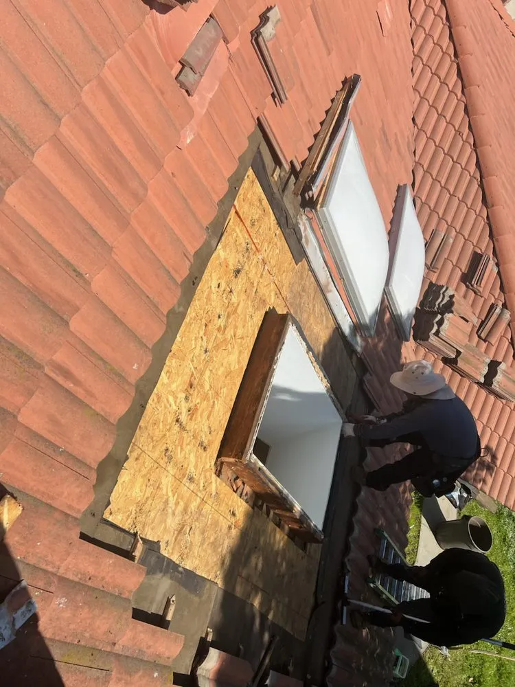 Slide of Ahn Top Roofing