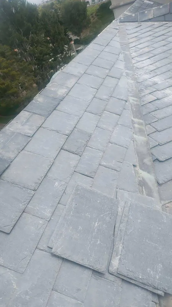 Slide of Ahn Top Roofing