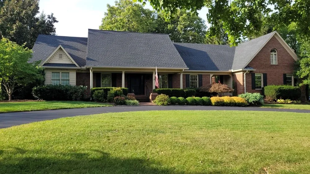 Slide of AIC Roofing & Construction