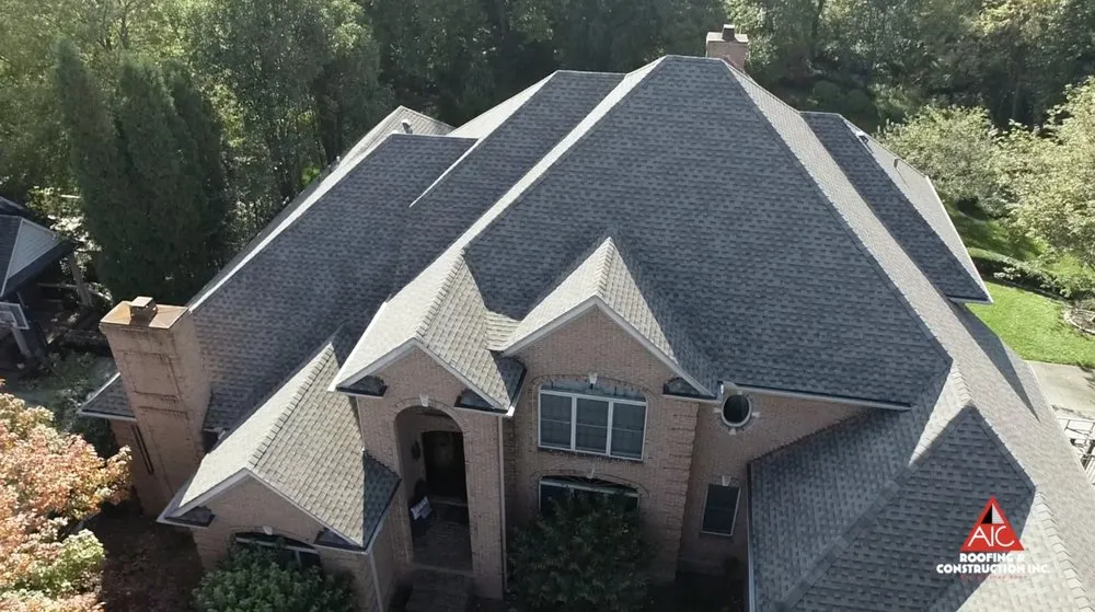 Slide of AIC Roofing & Construction