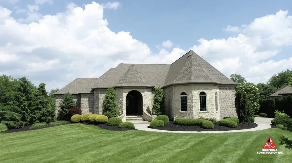 Slide of AIC Roofing & Construction