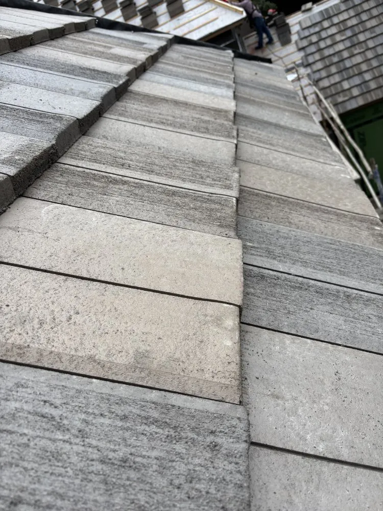 Slide of Aim High Roofing Solutions