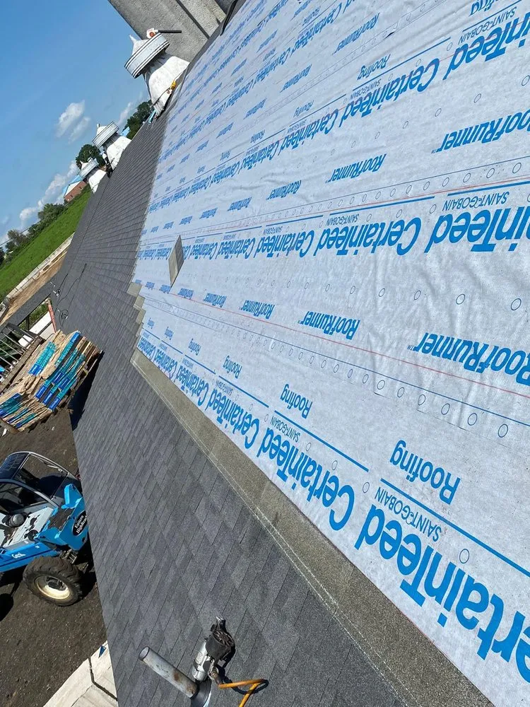 Slide of A&J Blessed Roof Exterior