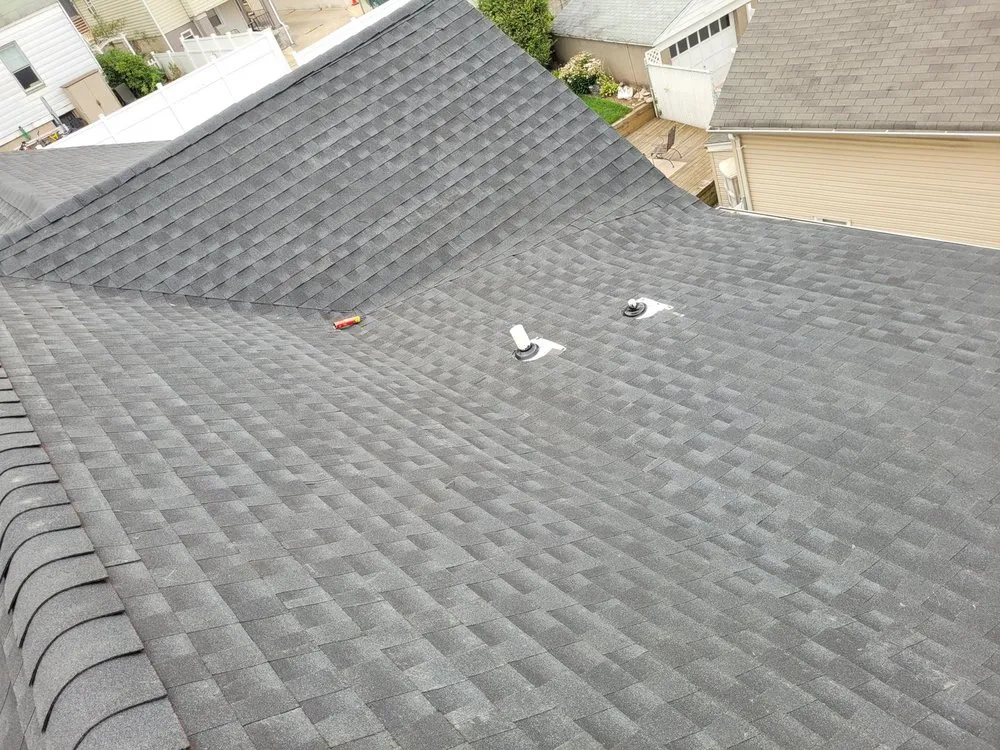 Slide of A&J Blessed Roof Exterior