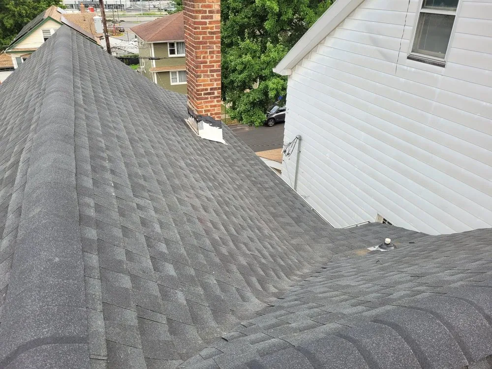 Slide of A&J Blessed Roof Exterior