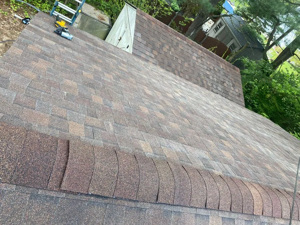 Slide of A&J Blessed Roof Exterior