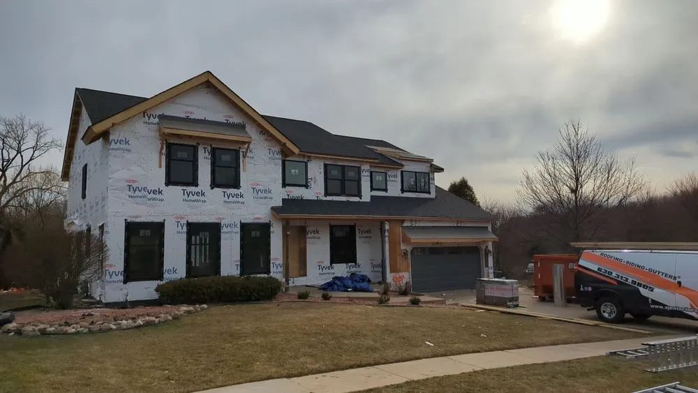 Slide of AJ Exteriors and Roofing