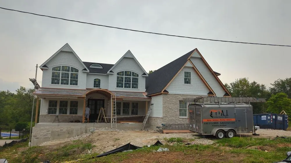 Slide of AJ Exteriors and Roofing