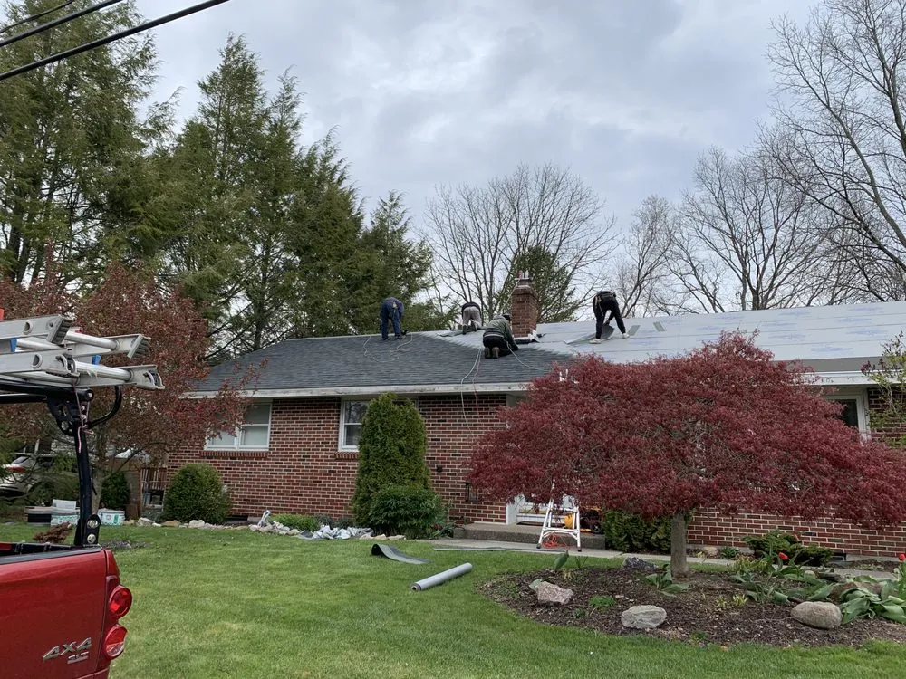 Slide of AJ Kerekes Roofing