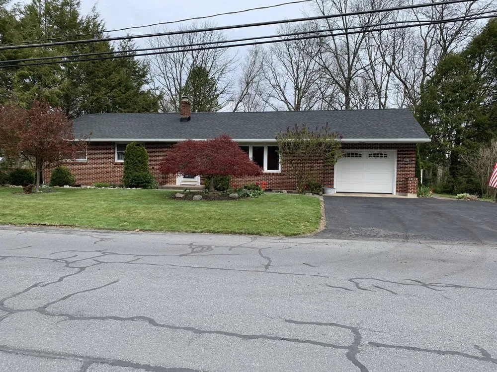 Slide of AJ Kerekes Roofing