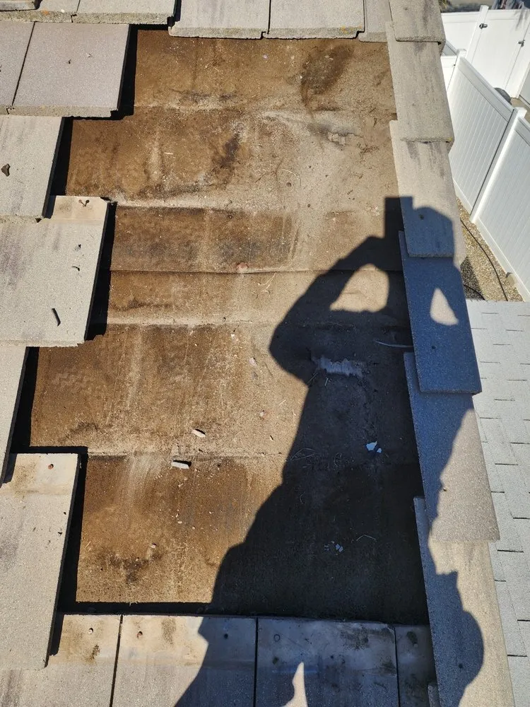 Slide of AJ Roofing Const