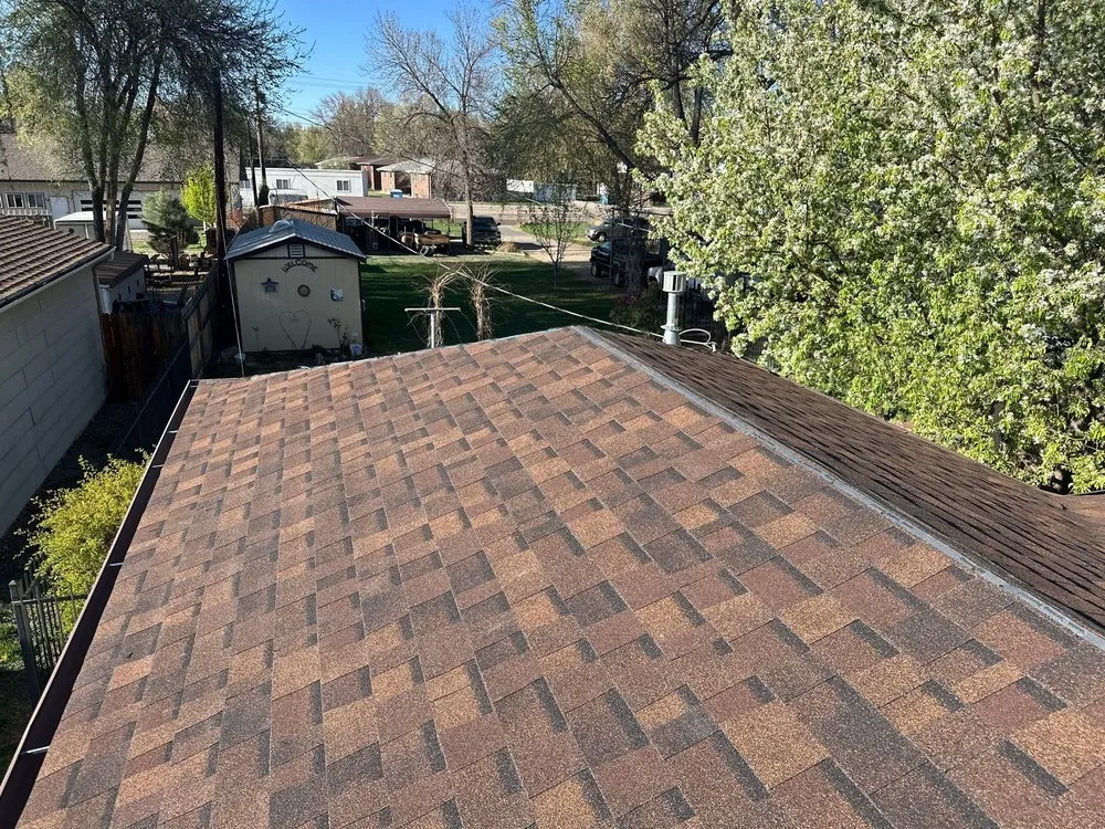 Slide of AJ Shirk Roofing