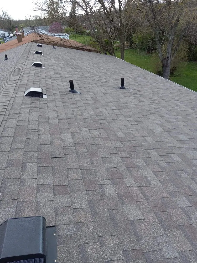 Slide of AJE Roofing