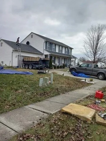 Slide of AJE Roofing