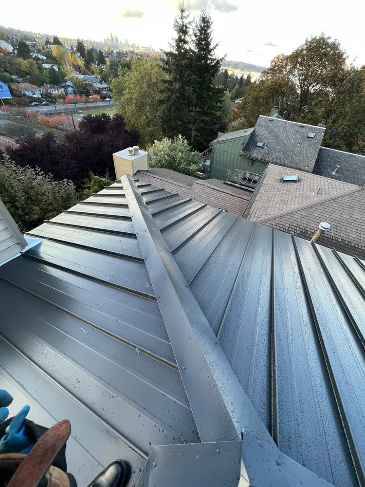 Slide of AJJ Morales Roofing