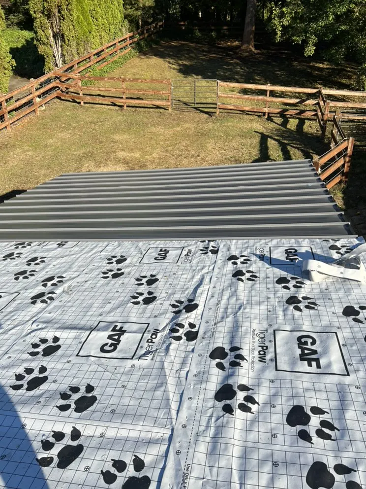 Slide of AJJ Morales Roofing