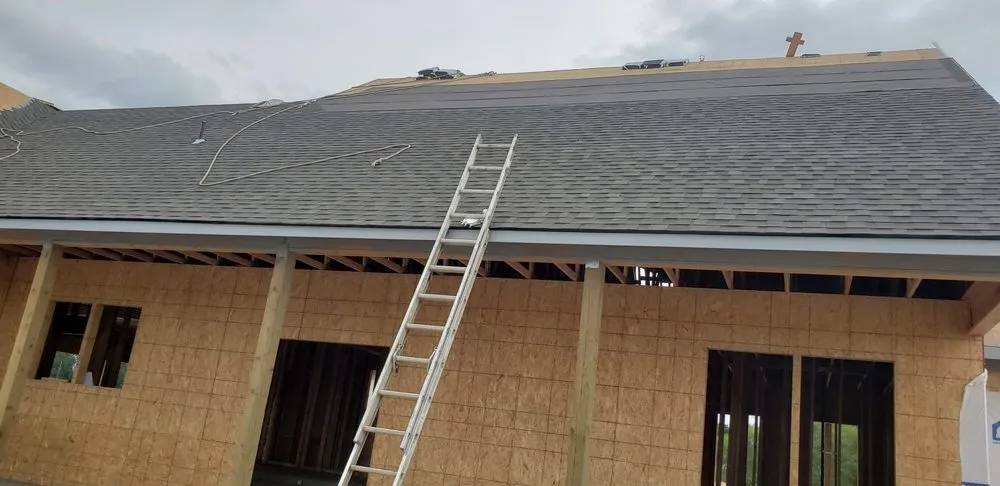 Slide of AJJ roofing