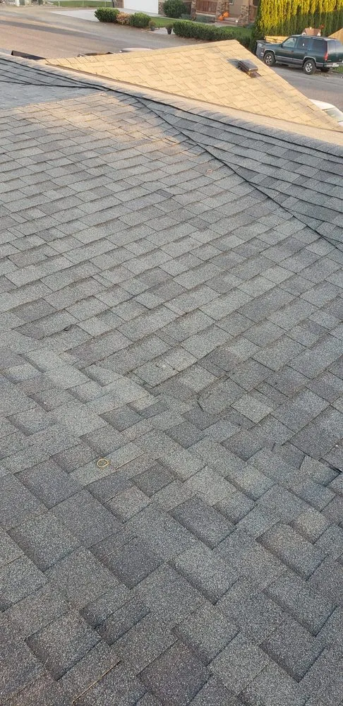 Slide of AJJ roofing