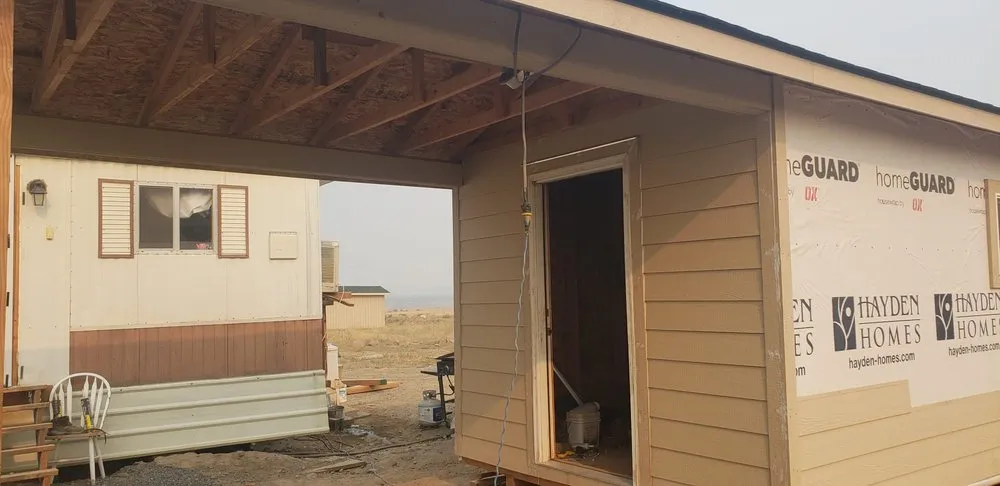 Slide of AJJ roofing