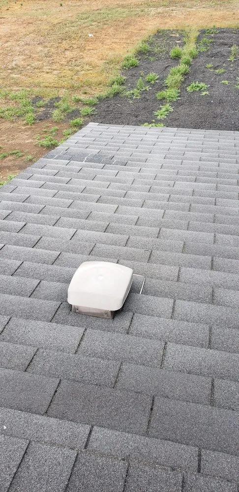 Slide of AJJ roofing