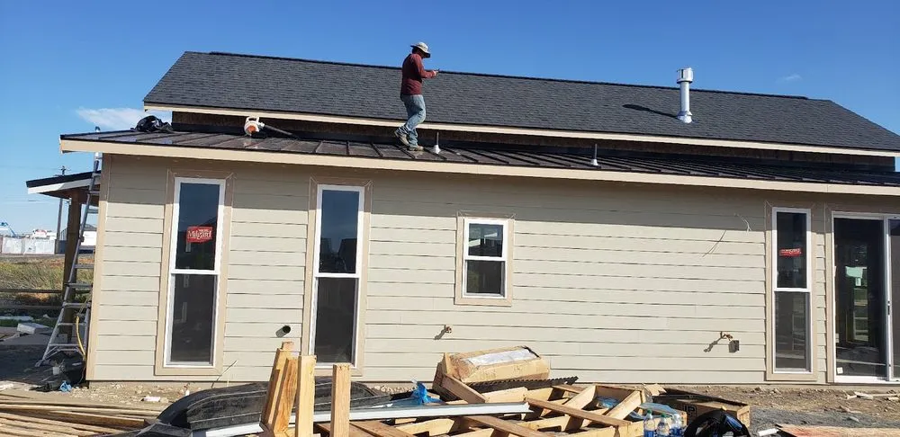 Slide of AJJ roofing