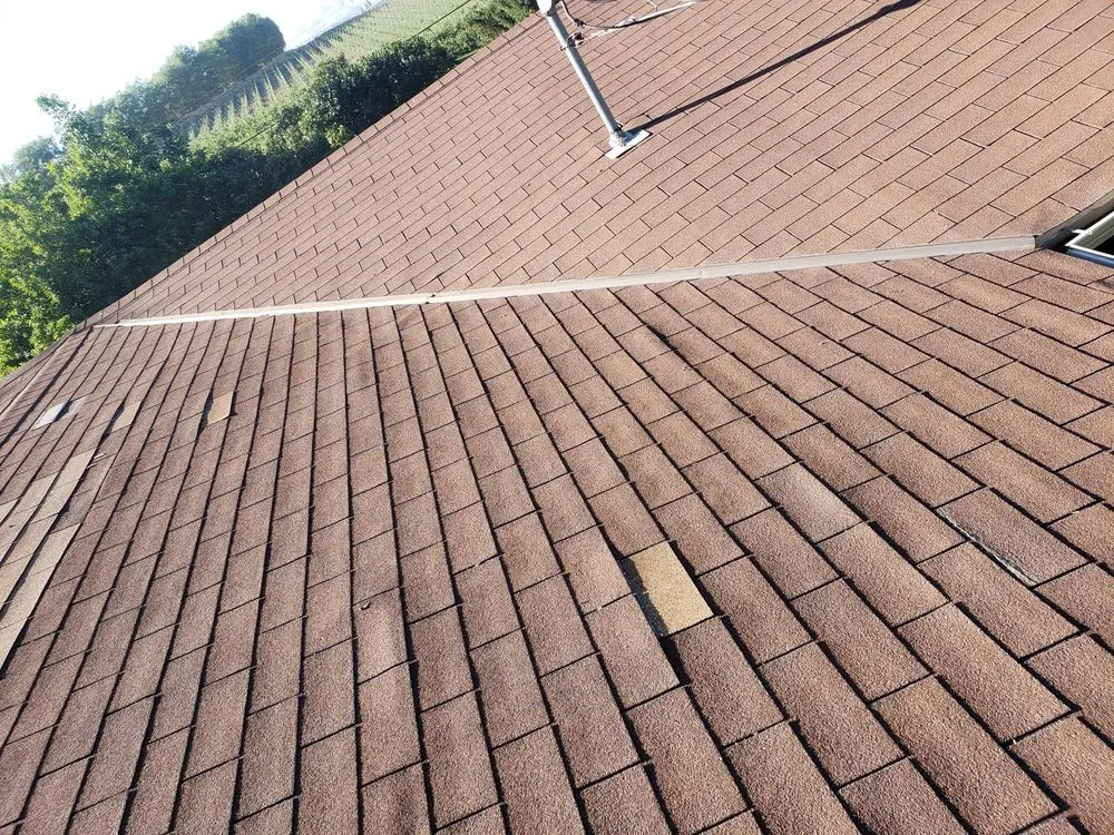 Slide of AJJ roofing