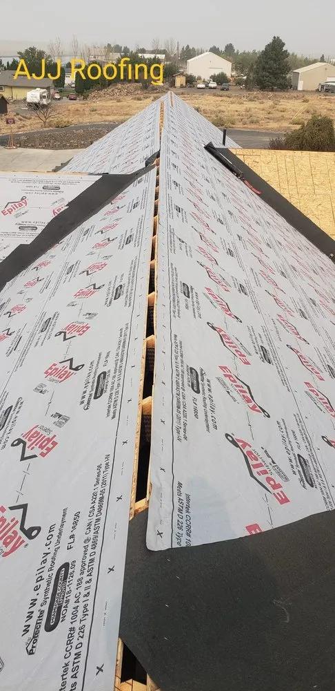 Slide of AJJ roofing