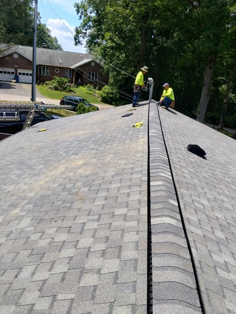 Slide of AJK Roofing