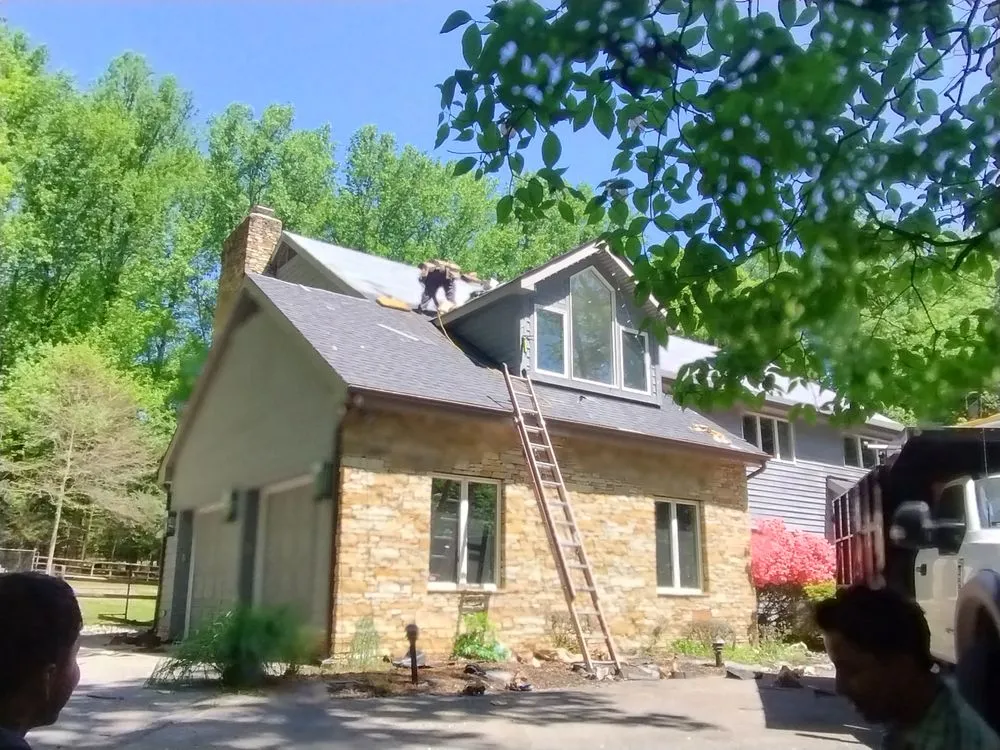 Slide of AJK Roofing