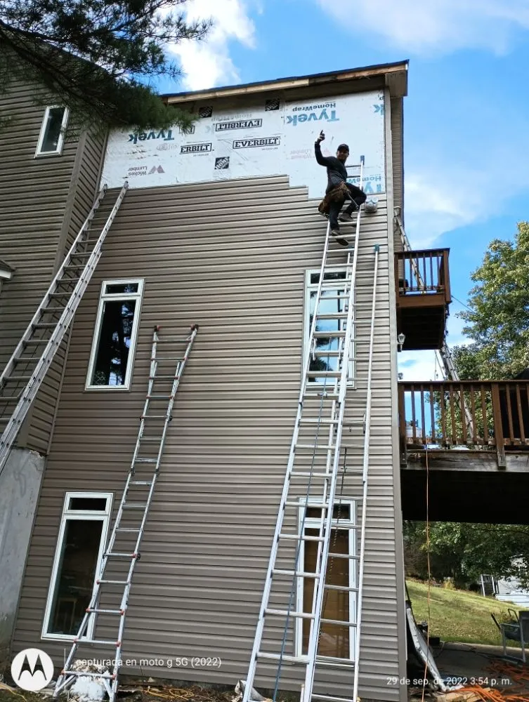 Slide of AJK Roofing