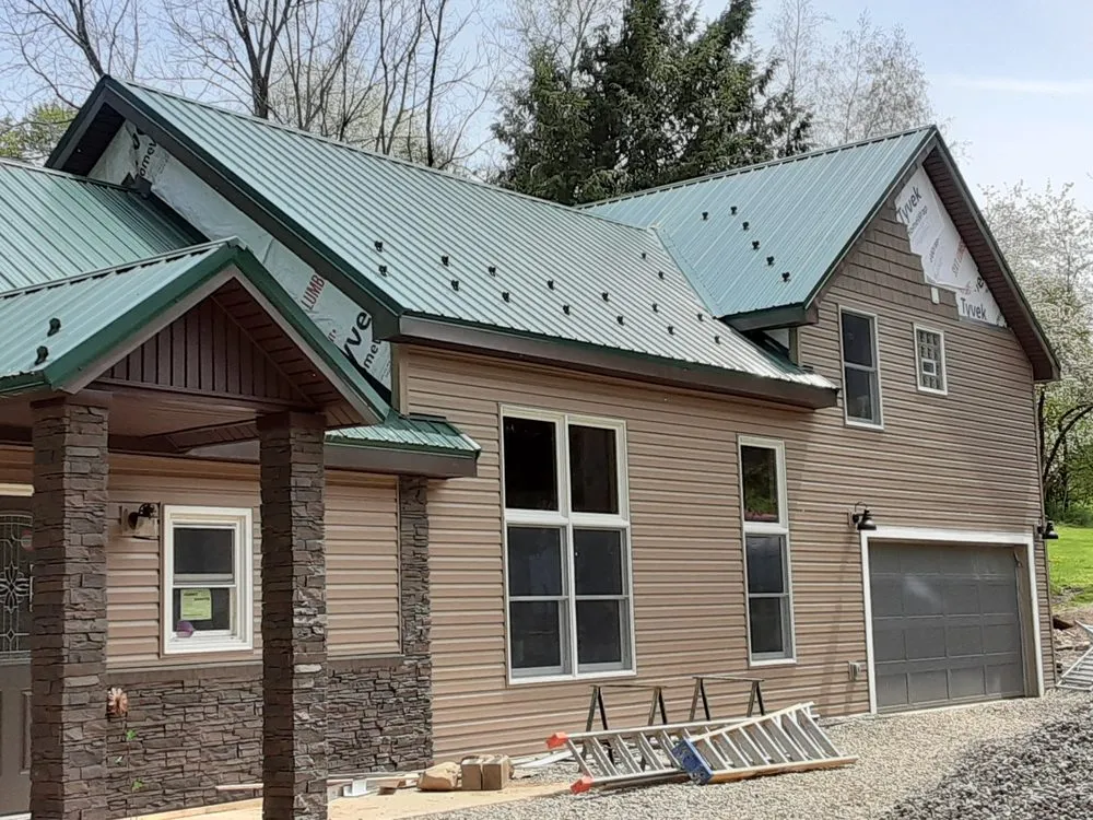 Slide of AJ's Metal Roofing And Siding
