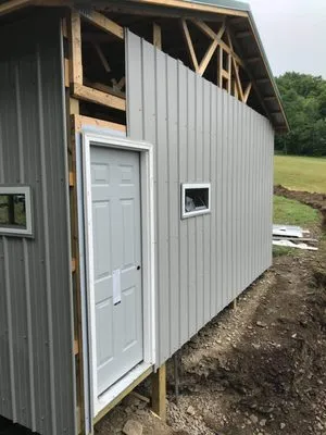 AJ's Metal Roofing And Siding Logo