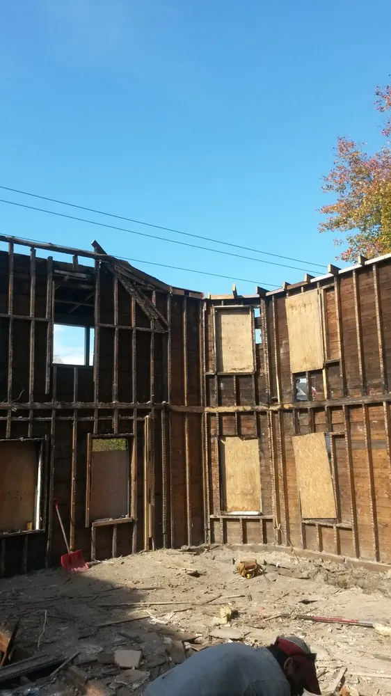 Slide of AJS Restoration & Construction