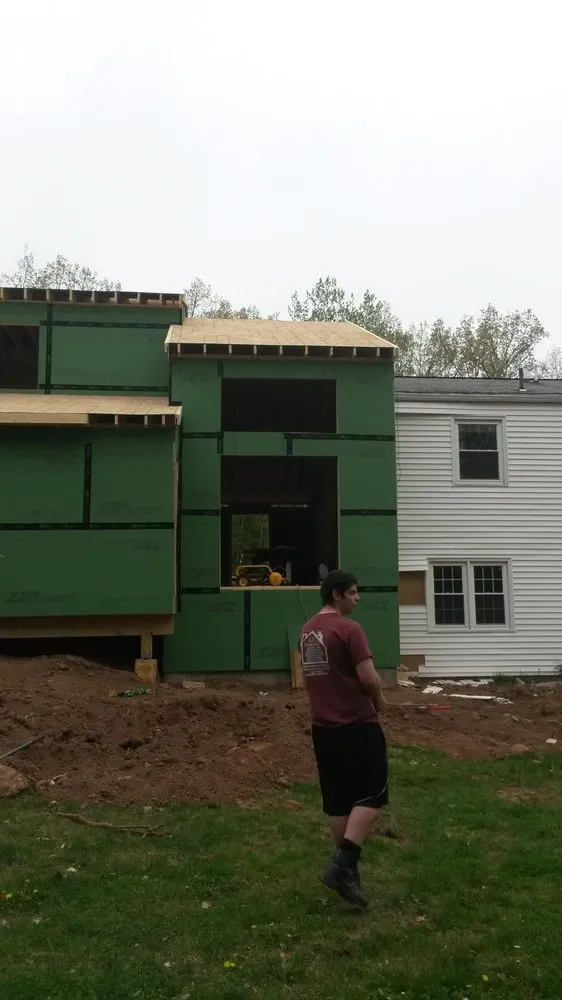 Slide of AJS Restoration & Construction