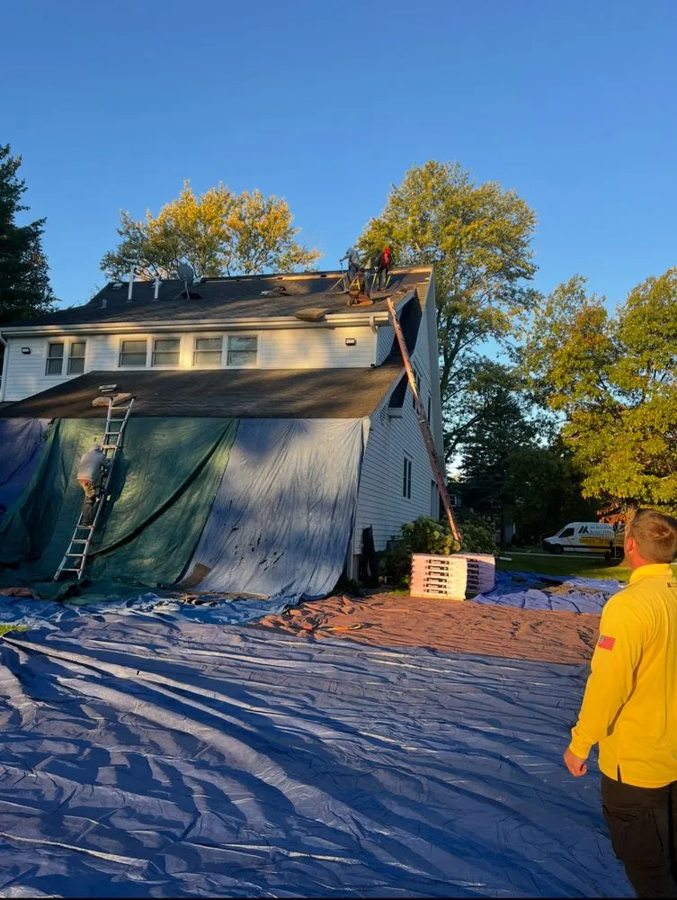 Slide of AK Roofing & Gutters