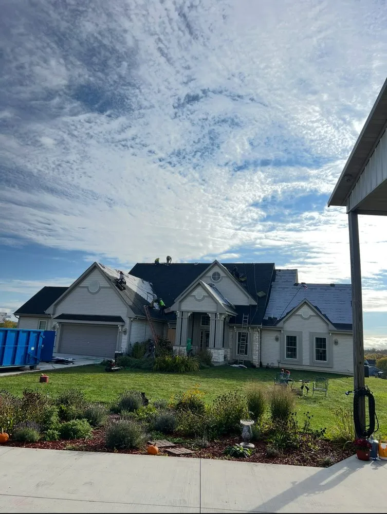 Slide of AK Roofing & Gutters