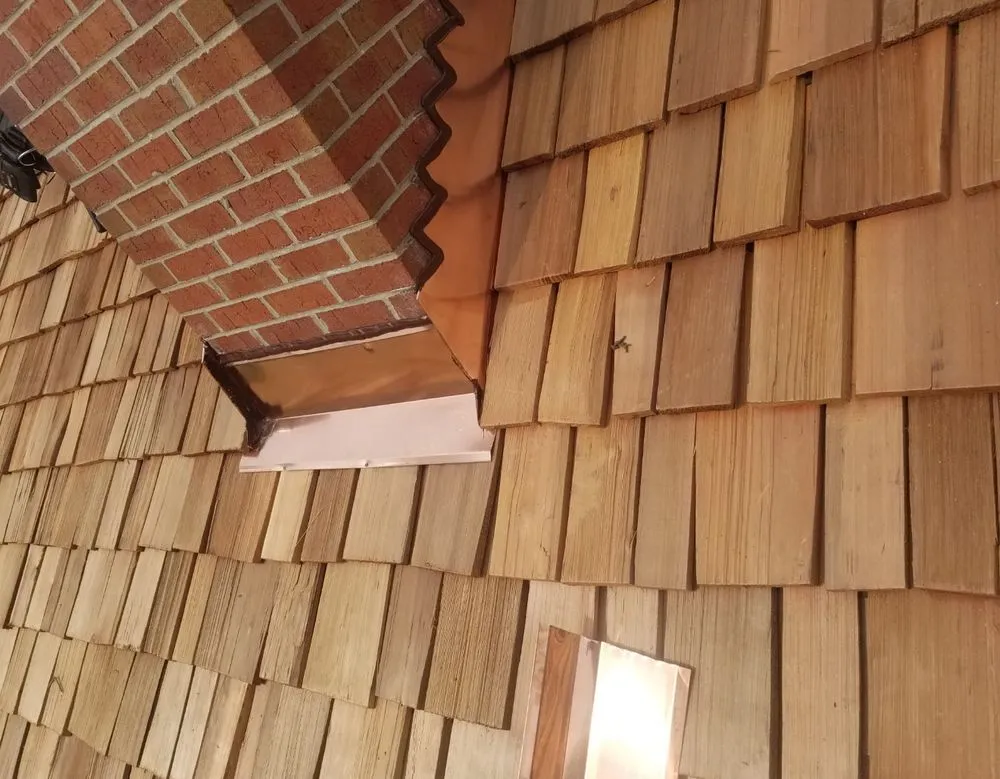 Slide of AK Roofing & Gutters