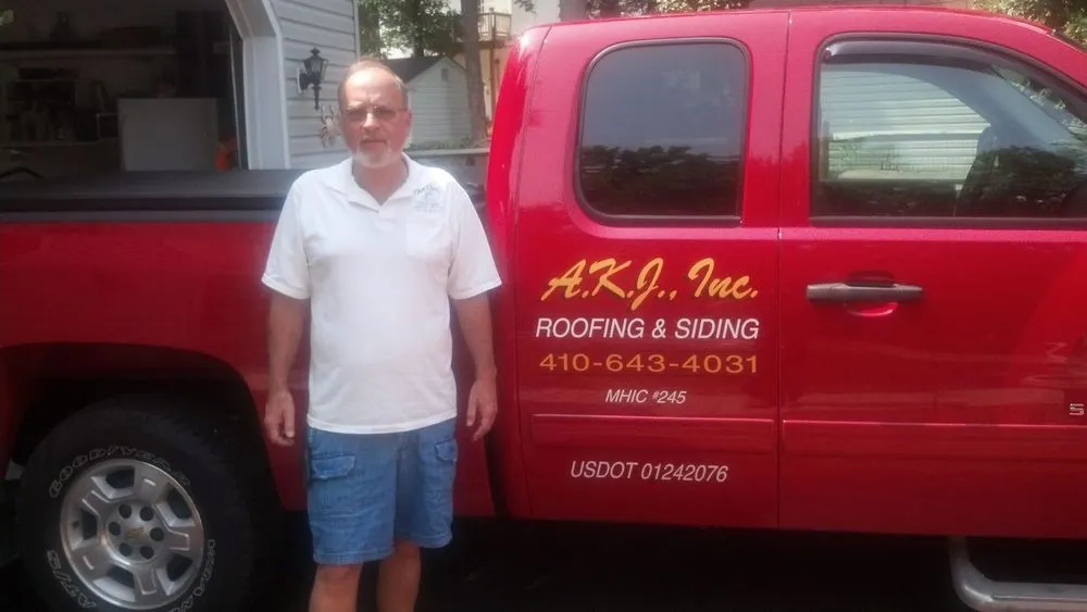 Slide of AKJ Roofing