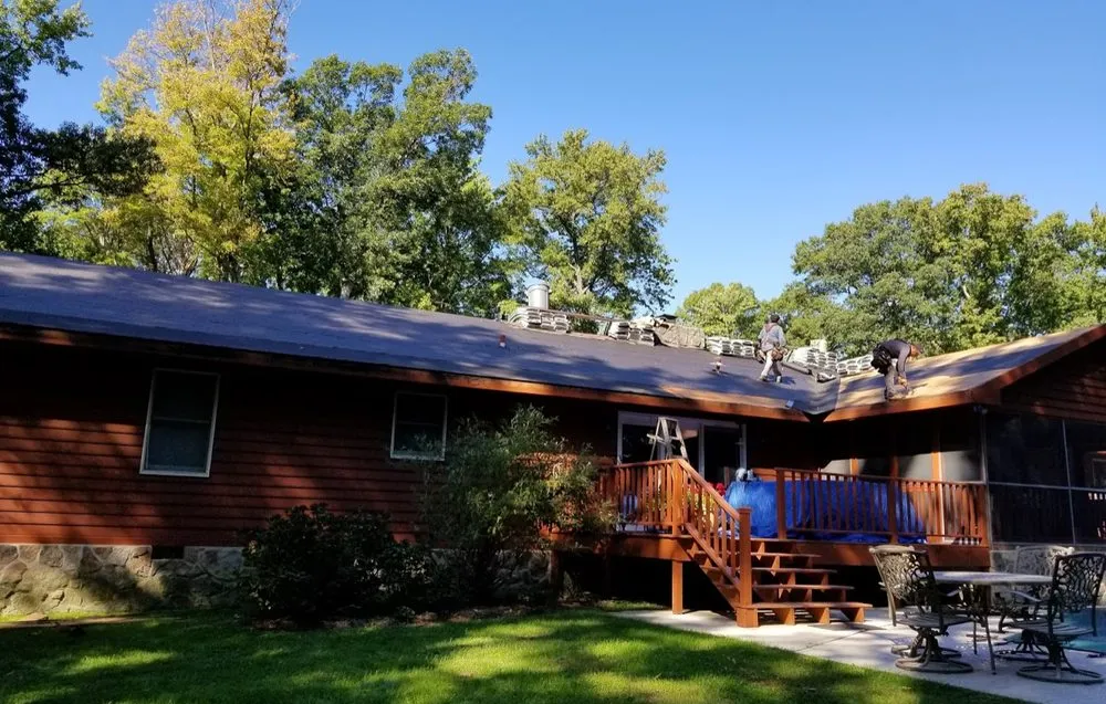 Slide of AKJ Roofing