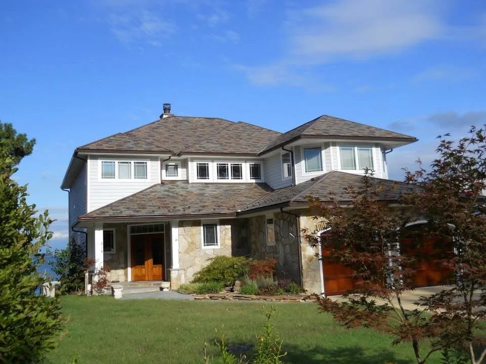 Slide of AKJ Roofing