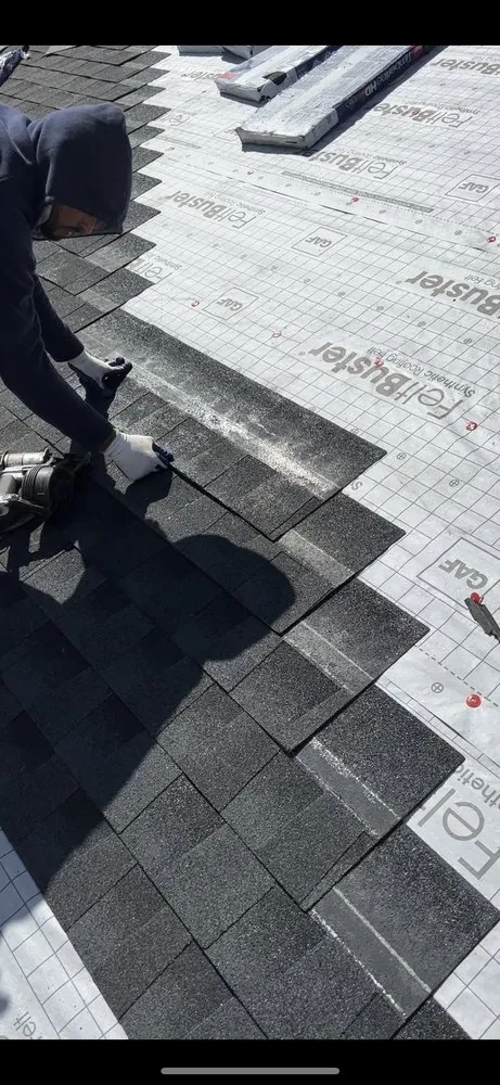 Slide of Akurate Roofing Group