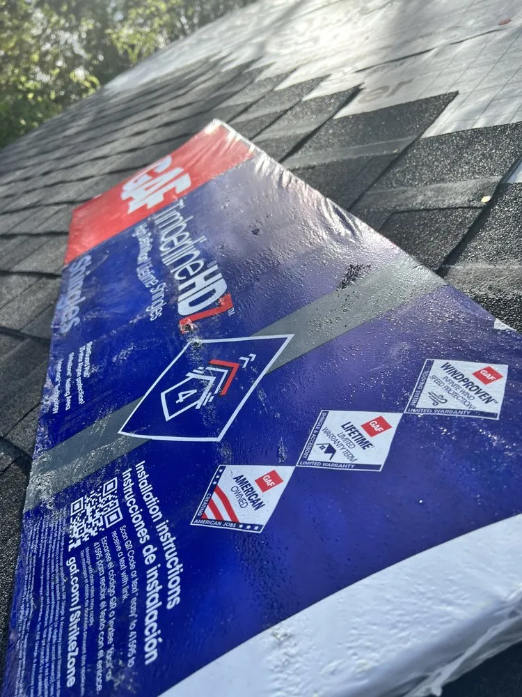 Slide of Akurate Roofing Group