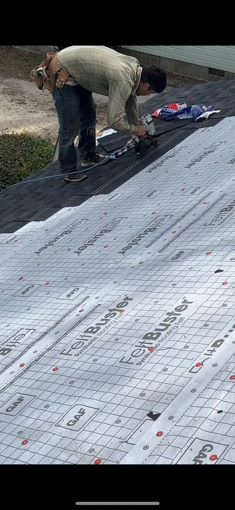 Slide of Akurate Roofing Group