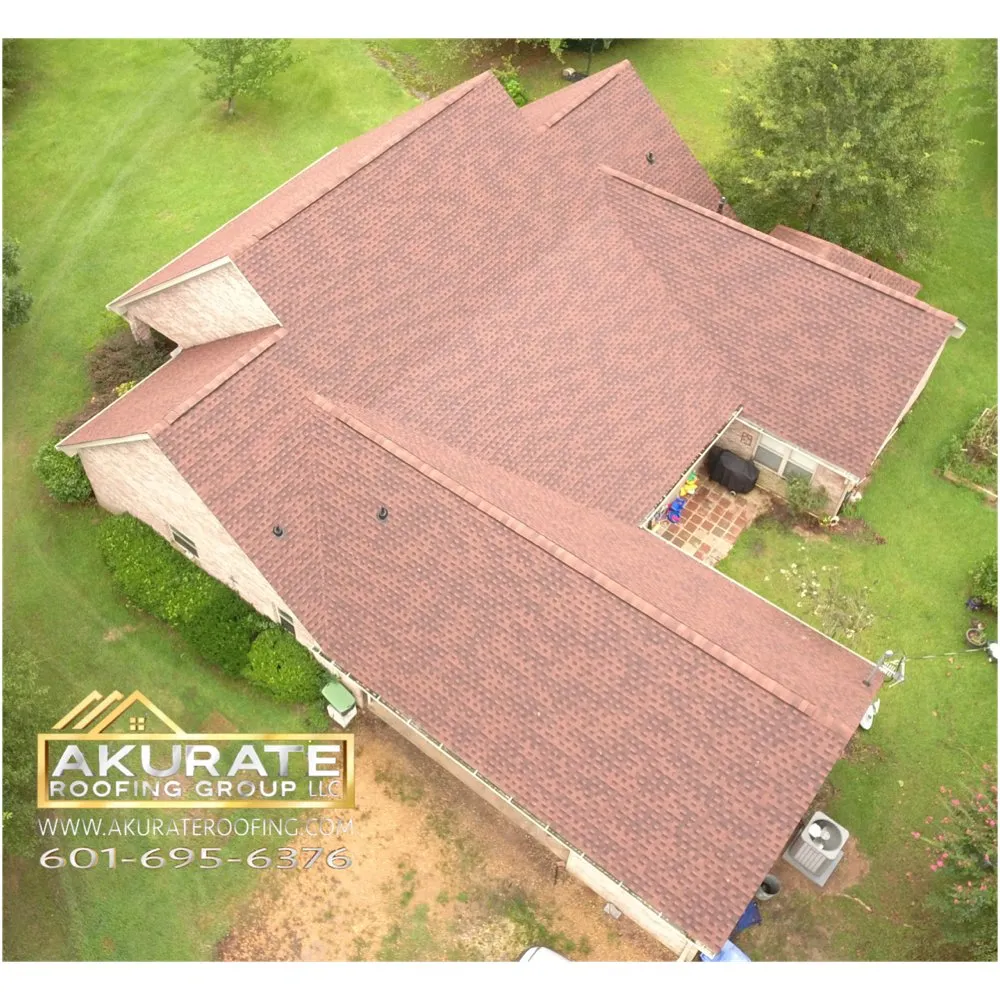 Slide of Akurate Roofing Group