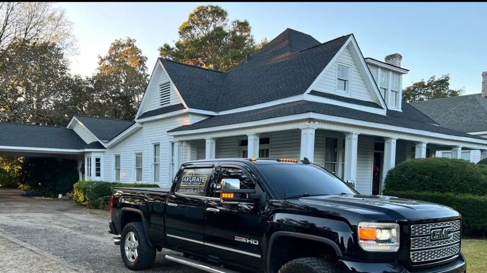 Slide of Akurate Roofing Group