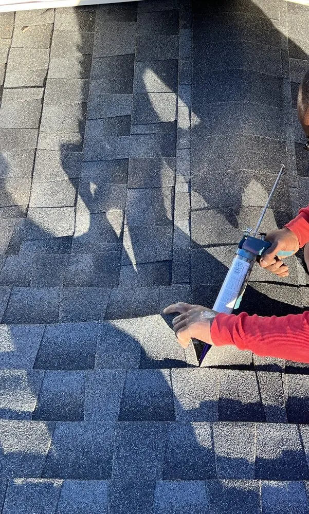 Slide of Akurate Roofing Group