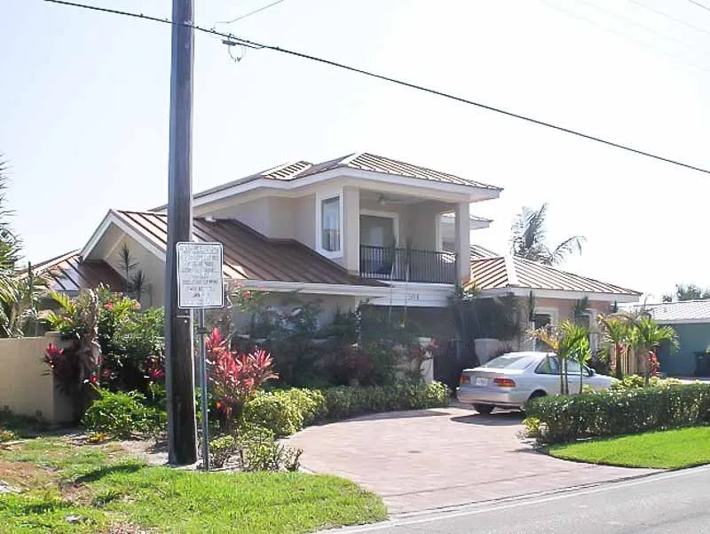 Slide of AKVM Roofing