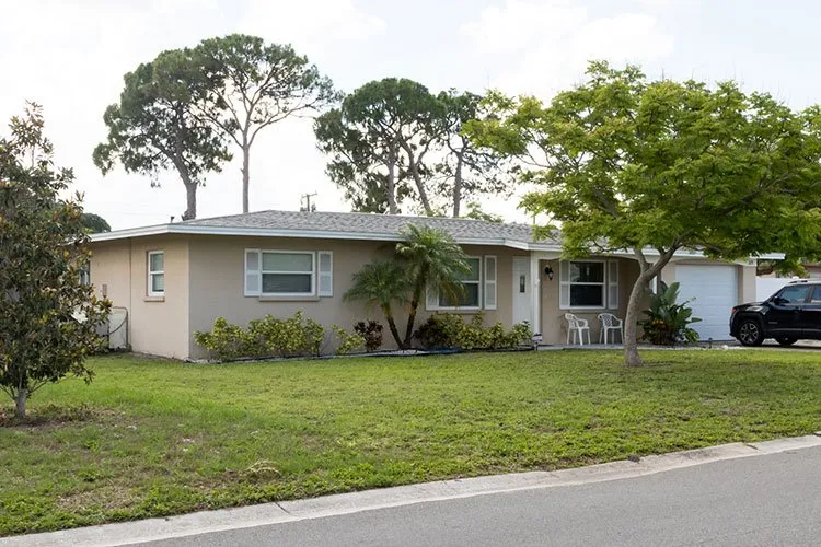 Slide of AKVM Roofing